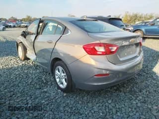 ✅ 2018 Chevrolet Cruze LT • VIN: 1G1BE5SM5J7210179 • Lot: 55759482. Listed on Copart with 53,919 mi. Free auction sales archive from the USA and detailed vehicle history report at DreamBid. Image 3.