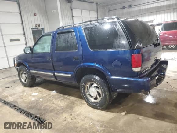 2001 Chevrolet Blazer LT with VIN 1GNDT13W912134288, listed as a Copart auction lot 87112824 with 152,925 mi miles and Salvage title. Bid and sale history available at DreamBid. Image 2.
