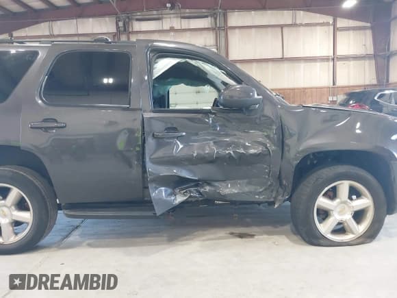 ✅ 2011 Chevrolet Tahoe LS • VIN: 1GNSKAE06BR260765 • Lot: 42675401. Listed on IAAI with 205,691 mi. Free auction sales archive from the USA and detailed vehicle history report at DreamBid. Image 6.