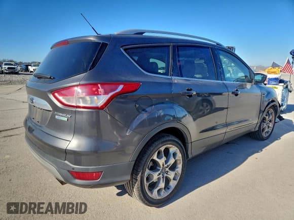 ✅ 2015 Ford Escape Titanium • VIN: 1FMCU0J98FUC32373 • Lot: 94688845. Wystawiony na Copart z przebiegiem 154 096 mil. Bezpłatny archiwum sprzedaży aukcyjnych z USA i szczegółowy raport historii pojazdu na DreamBid. Zdjęcie 3.