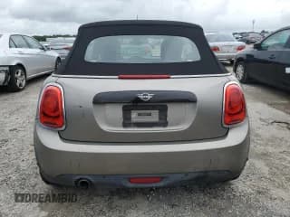 ✅ 2019 MINI Convertible Cooper • VIN: WMWWG5C52K3H07581 • Lot: 71253734. Listed on Copart with 70,704 mi. Free auction sales archive from the USA and detailed vehicle history report at DreamBid. Image 6.