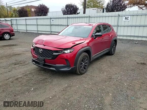 ✅ 2025 Mazda CX-50 S Premium • VIN: 7MMVABDM8SN304632 • Lot: 90594825. Listed on Copart with 17,711 mi. Free auction sales archive from the USA and detailed vehicle history report at DreamBid. Image 13.