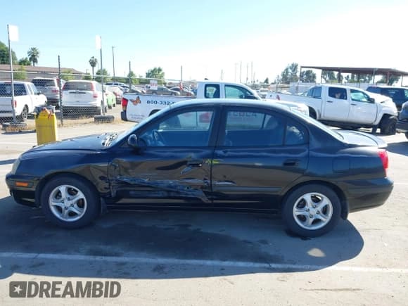 ✅ 2005 Hyundai Elantra GLS • VIN: KMHDN46D75U991942 • Lot: 42207546. Wystawiony na IAAI z przebiegiem 100 858 mil. Bezpłatny archiwum sprzedaży aukcyjnych z USA i szczegółowy raport historii pojazdu na DreamBid. Zdjęcie 14.