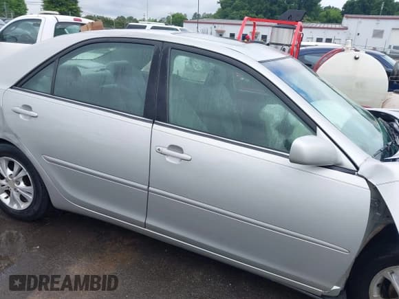 ✅ 2004 Toyota Camry LE • VIN: 4T1BF32K24U070150 • Lot: 42390540. Listed on IAAI with 380,768 mi. Free auction sales archive from the USA and detailed vehicle history report at DreamBid. Image 13.