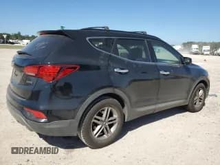 ✅ 2017 Hyundai Santa Fe 2.4L • VIN: 5XYZU3LB2HG409908 • Лот: 49079184. Опубликован ранее на Copart с пробегом Не указан. Бесплатный доступ к архиву аукционных продаж из США и подробный отчёт об истории автомобиля на DreamBid. Изображение 3.