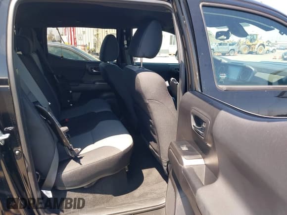 ✅ 2023 Toyota Tacoma SR • VIN: 3TMCZ5AN4PM602174 • Lot: 42851127. Listed on IAAI with 28,356 mi. Free auction sales archive from the USA and detailed vehicle history report at DreamBid. Image 8.