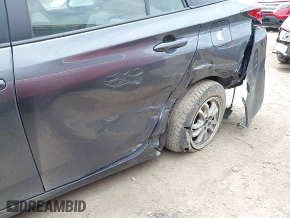 2022 Toyota Prius LE with VIN JTDL9MFU2N3034662, listed as a IAAI auction lot 42706682 with 79,255 mi miles and . Bid and sale history available at DreamBid. Image 6.