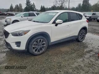 ✅ 2016 Mazda CX-5 Grand Touring • VIN: JM3KE4DY7G0666341 • Lot: 96183365. Wystawiony na Copart z przebiegiem 132 208 mil. Bezpłatny archiwum sprzedaży aukcyjnych z USA i szczegółowy raport historii pojazdu na DreamBid. Zdjęcie 1.