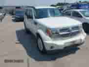 2008 Dodge Nitro SLT z VIN 1D8GT58K38W130289, wystawiony jako IAAI lot #43243543 z przebiegiem 212 660 mil mil oraz . Historia ofert i sprzedaży dostępna na DreamBid. Obrazek 1.