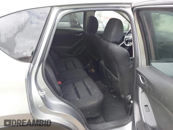 ✅ 2014 Mazda CX-5 Touring • VIN: JM3KE2CY5E0407804 • Lot: 43635952. Listed on IAAI with 143,735 mi. Free auction sales archive from the USA and detailed vehicle history report at DreamBid. Image 7.