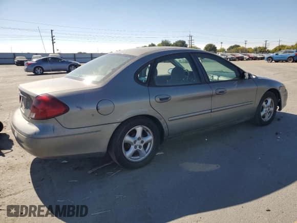✅ 2003 Ford Taurus SE Standard • VIN: 1FAFP53U73G111695 • Lot: 81001825. Wystawiony na Copart z przebiegiem 78 155 mil. Bezpłatny archiwum sprzedaży aukcyjnych z USA i szczegółowy raport historii pojazdu na DreamBid. Zdjęcie 3.