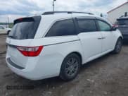 ✅ 2012 Honda Odyssey EX-L • VIN: 5FNRL5H60CB042274 • Lot: 42376811. Listed on IAAI with 169,350 mi. Free auction sales archive from the USA and detailed vehicle history report at DreamBid. Image 4.