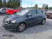 2013 Chevrolet Sonic LT with VIN 1G1JC6SG2D4148084, listed as a IAAI auction lot 43459236 with 94,963 mi miles and . Bid and sale history available at DreamBid. Image 2.