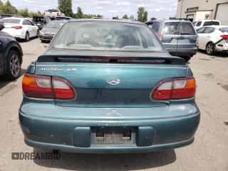 2000 Chevrolet Malibu LS z VIN 1G1NE52J4Y6330137, wystawiony jako Copart lot #64896574 z przebiegiem 161 842 mil mil oraz Czysty tytuł • Clean title. Historia ofert i sprzedaży dostępna na DreamBid. Obrazek 6.