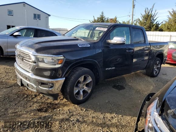 ✅ 2021 Ram 1500 Laramie • VIN: 1C6SRFJT3MN676601 • Лот: 84864265. Опубликован ранее на Copart с пробегом 124 485 миль. Бесплатный доступ к архиву аукционных продаж из США и подробный отчёт об истории автомобиля на DreamBid. Изображение 1.