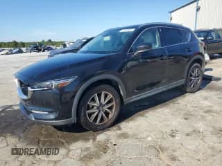 ✅ 2018 Mazda CX-5 Grand Touring • VIN: JM3KFADM2J1345415 • Lot: 87199005. Listed on Copart with 138,398 mi. Free auction sales archive from the USA and detailed vehicle history report at DreamBid. Image 1.