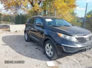 ✅ 2011 Kia Sportage LX • VIN: KNDPB3A2XB7053860 • Lot: 43566260. Wystawiony na IAAI z przebiegiem 157 672 mil. Bezpłatny archiwum sprzedaży aukcyjnych z USA i szczegółowy raport historii pojazdu na DreamBid. Zdjęcie 1.