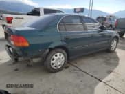 ✅ 1998 Honda Civic LX • VIN: 2HGEJ6578WH569101 • Lot: 86774595. Listed on Copart with 201,386 mi. Free auction sales archive from the USA and detailed vehicle history report at DreamBid. Image 3.