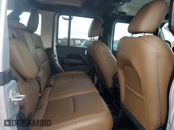 ✅ 2022 Jeep Wrangler Unlimited Sahara • VIN: 1C4JJXP69NW279828 • Lot: 84058525. Listed on Copart with 8,315 mi. Free auction sales archive from the USA and detailed vehicle history report at DreamBid. Image 10.