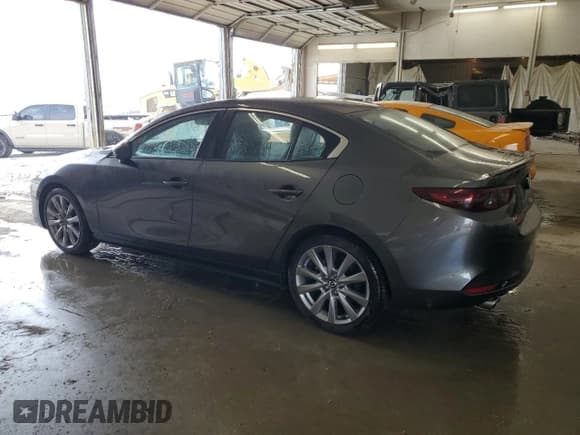 ✅ 2021 Mazda 3 Select • VIN: JM1BPABL0M1324695 • Lot: 80465435. Listed on Copart with 39,057 mi. Free auction sales archive from the USA and detailed vehicle history report at DreamBid. Image 2.