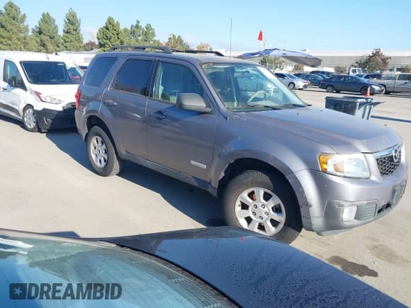 ✅ 2008 Mazda Tribute Touring • VIN: 4F2CZ02ZX8KM14269 • Lot: 43794132. Listed on IAAI with 161,694 mi. Free auction sales archive from the USA and detailed vehicle history report at DreamBid. Image 1.