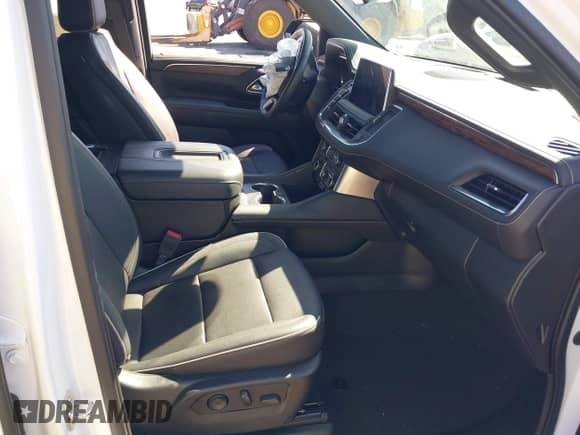 2023 Chevrolet Tahoe Premier z VIN 1GNSKSKD7PR196918, wystawiony jako IAAI lot #43356101 z przebiegiem 13 675 mil mil oraz . Historia ofert i sprzedaży dostępna na DreamBid. Obrazek 5.