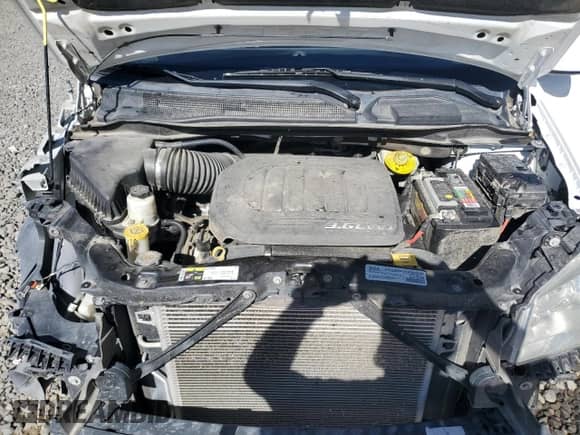 2018 Dodge Grand Caravan SXT z VIN 2C4RDGCG1JR208215, wystawiony jako Copart lot #87284535 z przebiegiem 147 406 mil mil oraz Szkoda całkowita • Salvage title. Historia ofert i sprzedaży dostępna na DreamBid. Obrazek 12.