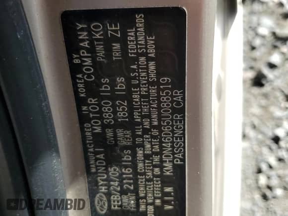 2005 Hyundai Elantra GLS z VIN KMHDN46D65U088519, wystawiony jako Copart lot #74489844 z przebiegiem 31 211 mil mil oraz Szkoda całkowita • Salvage title. Historia ofert i sprzedaży dostępna na DreamBid. Obrazek 13.