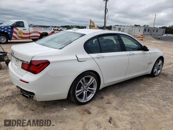 ✅ 2014 BMW 7 Series 740i • VIN: WBAYA6C57ED144572 • Lot: 70323644. Listed on Copart with 88,977 mi. Free auction sales archive from the USA and detailed vehicle history report at DreamBid. Image 3.