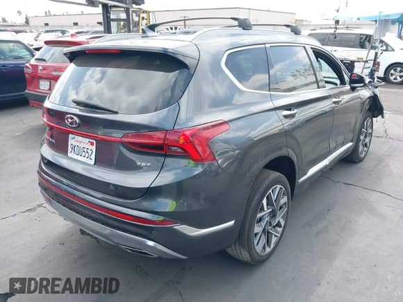 2023 Hyundai Santa Fe Calligraphy with VIN 5NMS54AL5PH613137, listed as a IAAI auction lot 43221208 with 28,585 mi miles and . Bid and sale history available at DreamBid. Image 4.
