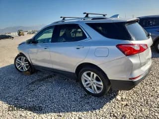 ✅ 2018 Chevrolet Equinox Premier • VIN: 3GNAXWEX3JS513351 • Лот: 85690805. Опубликован ранее на Copart с пробегом 82 483 миль. Бесплатный доступ к архиву аукционных продаж из США и подробный отчёт об истории автомобиля на DreamBid. Изображение 2.
