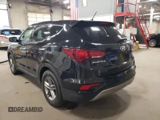 ✅ 2018 Hyundai Santa Fe 2.4L • VIN: 5XYZTDLB3JG560299 • Лот: 66883412. Опубликован ранее на Copart с пробегом 69 737 миль. Бесплатный доступ к архиву аукционных продаж из США и подробный отчёт об истории автомобиля на DreamBid. Изображение 3.