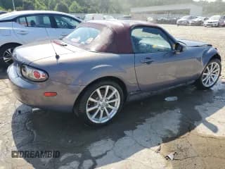 ✅ 2006 Mazda MX-5 Miata Touring • VIN: JM1NC25F360103136 • Lot: 61464444. Wystawiony na Copart z przebiegiem 142 141 mil. Bezpłatny archiwum sprzedaży aukcyjnych z USA i szczegółowy raport historii pojazdu na DreamBid. Zdjęcie 3.
