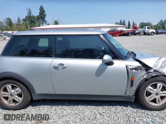 ✅ 2006 MINI Hardtop • VIN: WMWRC33516TK16354 • Lot: 42565359. Listed on IAAI with 111,800 mi. Free auction sales archive from the USA and detailed vehicle history report at DreamBid. Image 13.