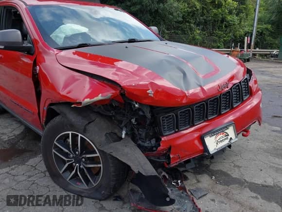 2021 Jeep Grand Cherokee Trailhawk with VIN 1C4RJFLGXMC579888, listed as a IAAI auction lot 42951354 with 76,948 mi miles and . Bid and sale history available at DreamBid. Image 6.