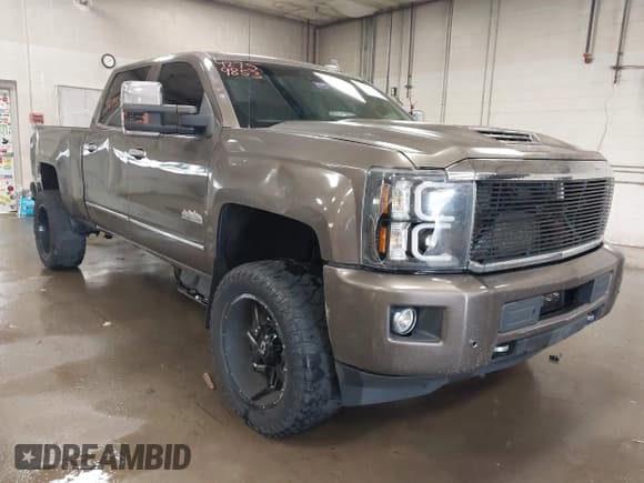 ✅ 2018 Chevrolet Silverado 2500HD High Country • VIN: 1GC1KXEY7JF102223 • Лот: 42759853. Опубликован ранее на IAAI с пробегом 89 061 миль. Бесплатный доступ к архиву аукционных продаж из США и подробный отчёт об истории автомобиля на DreamBid. Изображение 1.