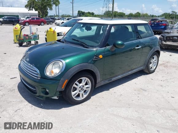 ✅ 2011 MINI Hardtop • VIN: WMWSU3C57BT093085 • Lot: 42492893. Listed on IAAI with 119,576 mi. Free auction sales archive from the USA and detailed vehicle history report at DreamBid. Image 2.