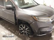 ✅ 2021 Honda Pilot Touring 8-Passenger • VIN: 5FNYF6H99MB028751 • Лот: 41226814. Опубликован ранее на IAAI с пробегом Не указан. Бесплатный доступ к архиву аукционных продаж из США и подробный отчёт об истории автомобиля на DreamBid. Изображение 6.