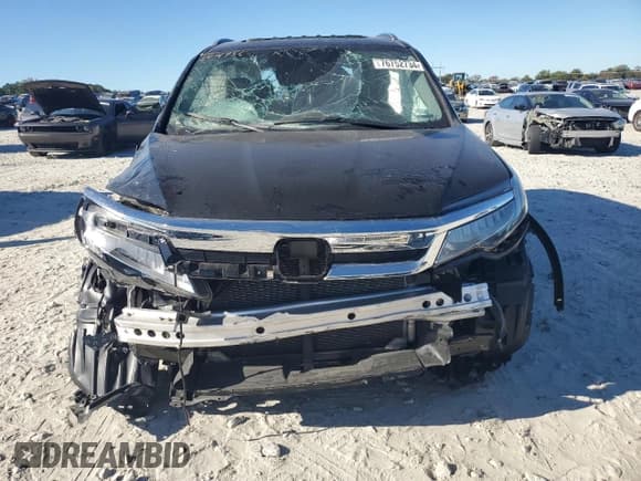 ✅ 2019 Honda Pilot Touring 8-Passenger • VIN: 5FNYF5H99KB013691 • Lot: 76752734. Listed on Copart with Not provided. Free auction sales archive from the USA and detailed vehicle history report at DreamBid. Image 5.