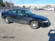 ✅ 2001 Oldsmobile Alero GL2 • VIN: 1G3NL52E81C231960 • Lot: 41634551. Listed on IAAI with 132,907 mi. Free auction sales archive from the USA and detailed vehicle history report at DreamBid. Image 1.