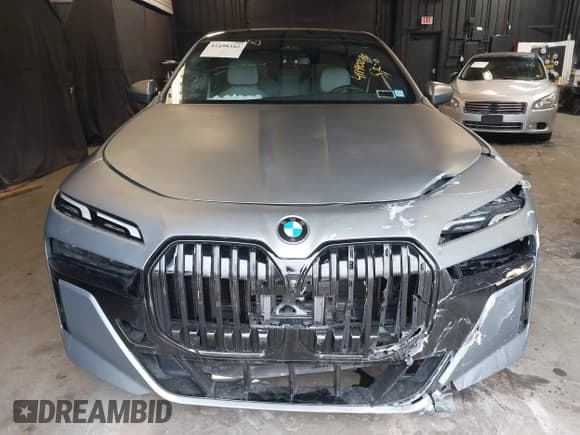 ✅ 2023 BMW 7 Series 760i xDrive • VIN: WBA33EJ09PCM90606 • Lot: 41498342. Listed on IAAI with 36,838 mi. Free auction sales archive from the USA and detailed vehicle history report at DreamBid. Image 12.