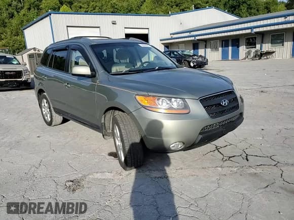 ✅ 2009 Hyundai Santa Fe SE • VIN: 5NMSH73E69H315402 • Lot: 70574574. Listed on Copart with 147,732 mi. Free auction sales archive from the USA and detailed vehicle history report at DreamBid. Image 12.