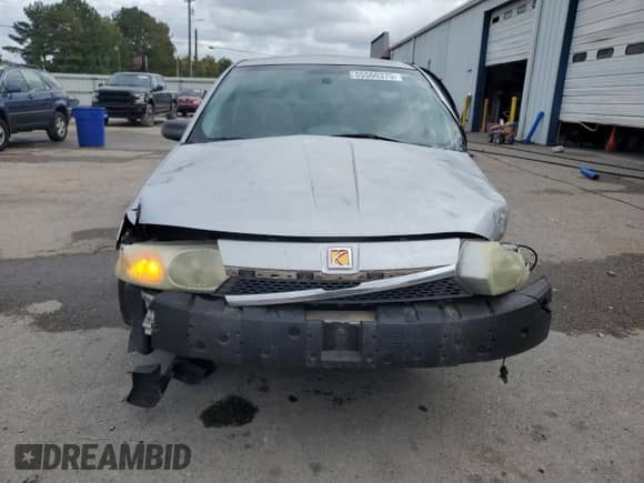 2004 Saturn ION ION 1 z VIN 1G8AG52FX4Z121029, wystawiony jako Copart lot #85560375 z przebiegiem 196 911 mil mil oraz Szkoda całkowita • Salvage title. Historia ofert i sprzedaży dostępna na DreamBid. Obrazek 5.