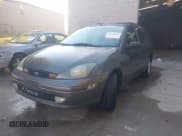 ✅ 2003 Ford Focus SE Fleet • VIN: 1FAFP36303W293074 • Lot: 43709410. Listed on IAAI with 260,595 mi. Free auction sales archive from the USA and detailed vehicle history report at DreamBid. Image 2.