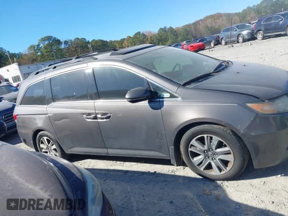 ✅ 2016 Honda Odyssey Touring Elite • VIN: 5FNRL5H95GB013353 • Lot: 43670419. Listed on IAAI with 210,143 mi. Free auction sales archive from the USA and detailed vehicle history report at DreamBid. Image 13.