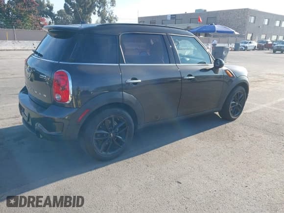 ✅ 2015 MINI Countryman S • VIN: WMWZC3C58FWT03263 • Lot: 43860602. Listed on IAAI with 99,653 mi. Free auction sales archive from the USA and detailed vehicle history report at DreamBid. Image 4.