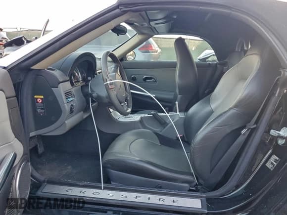 ✅ 2005 Chrysler Crossfire Limited • VIN: 1C3AN65L15X060464 • Lot: 94592825. Listed on Copart with 65,957 mi. Free auction sales archive from the USA and detailed vehicle history report at DreamBid. Image 7.