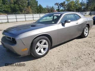 2011 Dodge Challenger с VIN 2B3CJ4DG4BH604269, выставлен на аукционе Copart как лот 81925785 с пробегом 159 015 миль миль и Списание • Salvage title. История ставок и продаж доступна на DreamBid. Изображение 1.