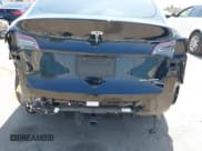 ✅ 2023 Tesla Model Y Long Range • VIN: 7SAYGDEE0PA023719 • Lot: 41974415. Listed on IAAI with 50,152 mi. Free auction sales archive from the USA and detailed vehicle history report at DreamBid. Image 6.