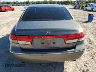 2006 Hyundai Azera SE с VIN KMHFC46F16A133367, выставлен на аукционе Copart как лот 81537464 с пробегом Не указан миль и Списание • Salvage title. История ставок и продаж доступна на DreamBid. Изображение 6.